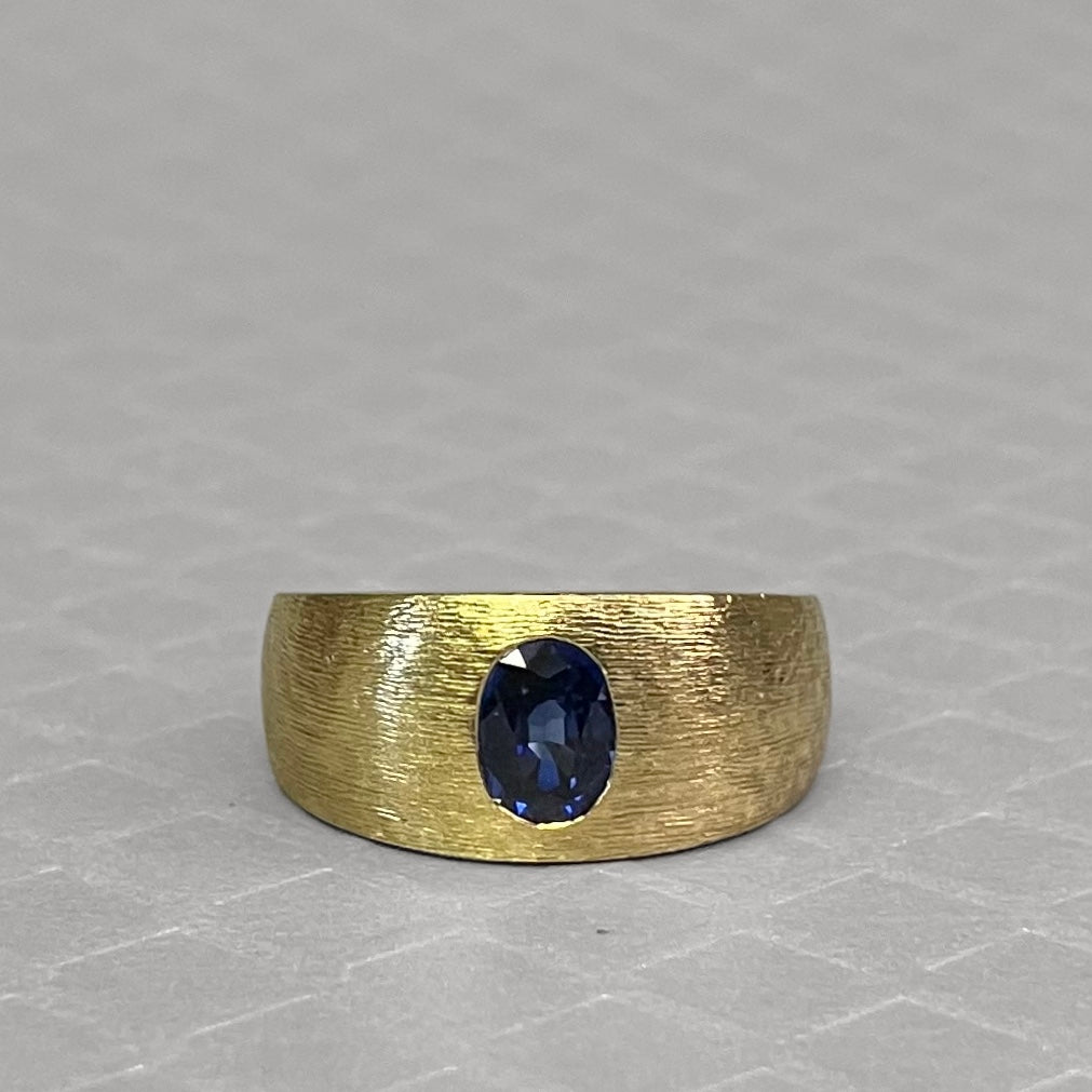 Preowned Yellow Gold and Oval Blue Sapphire Textured Ring