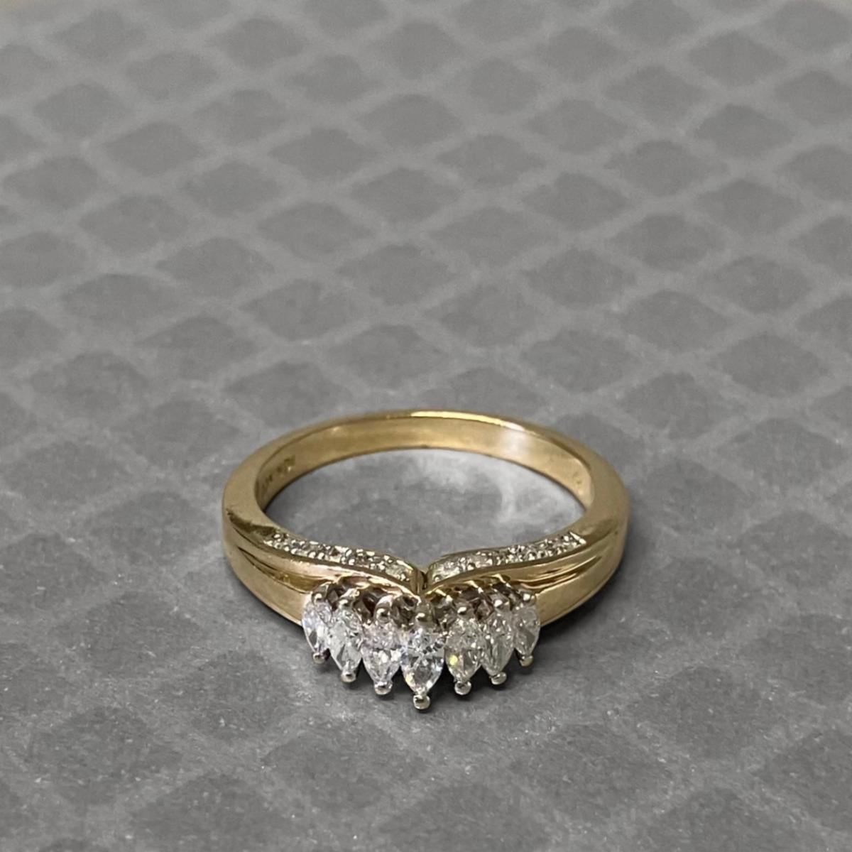 Preowned Yellow Gold and Graduated Marquise Diamond Ring