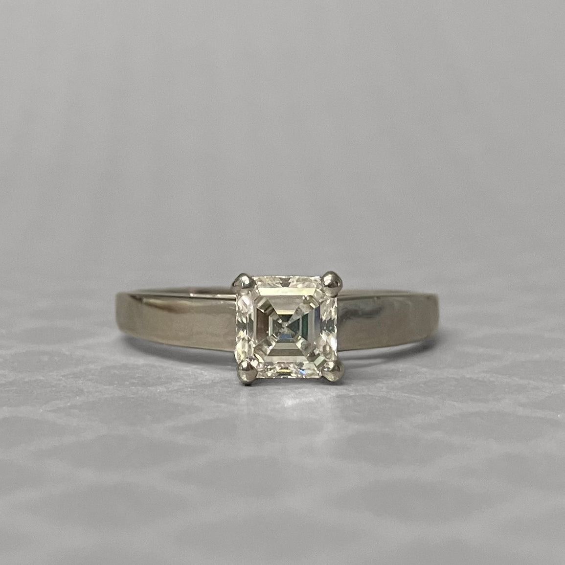 Preowned White Gold and Square Step Cut Diamond Engagement Ring