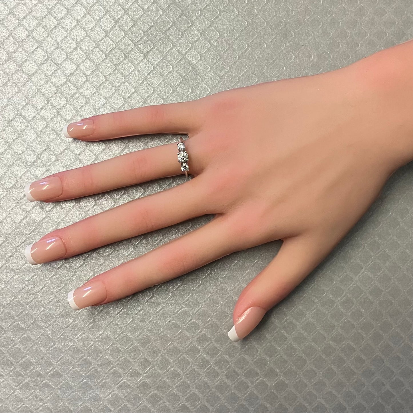 Preowned Platinum and Three Round Brilliant Cut Diamond Engagement Ring