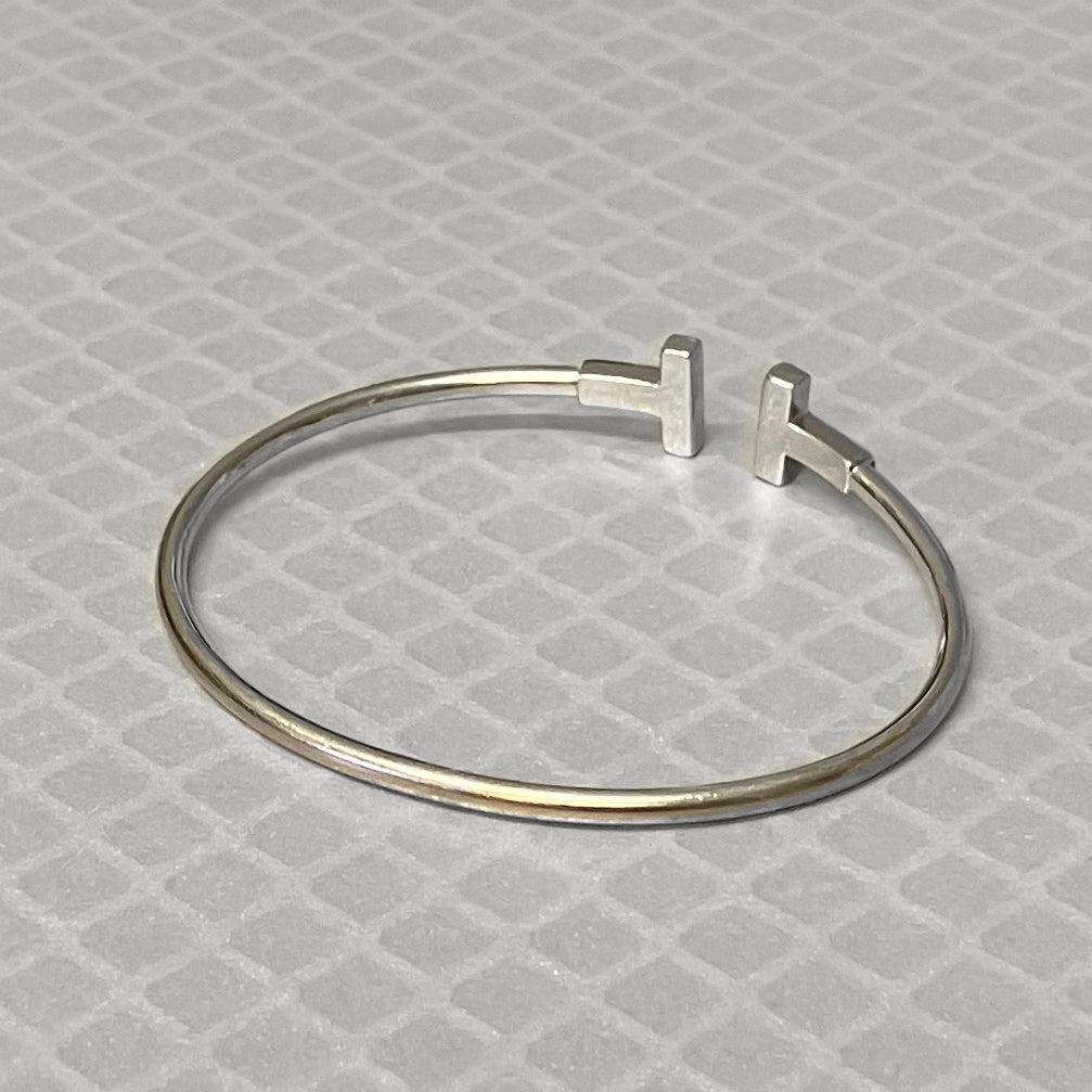 Preowned White Gold and Blue Sapphire Tiffany & Co. T Wire Bracelet