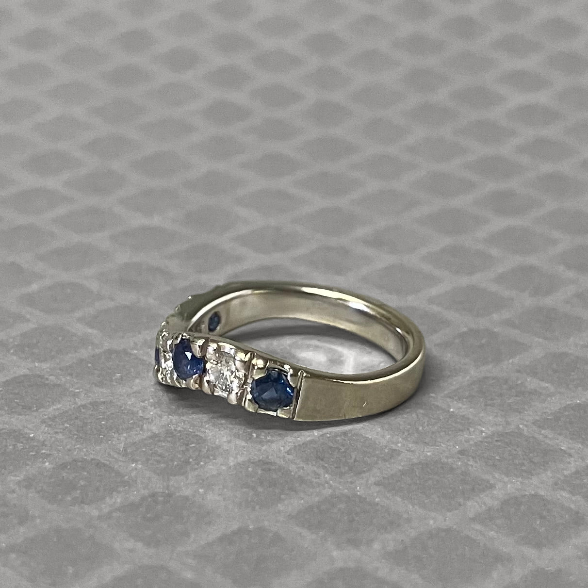Preowned White Gold Blue Sapphire and Diamond Curve Ring