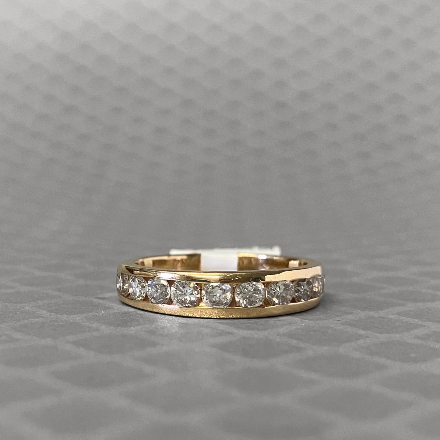 Preowned Yellow Gold and Channel Set Diamond Band