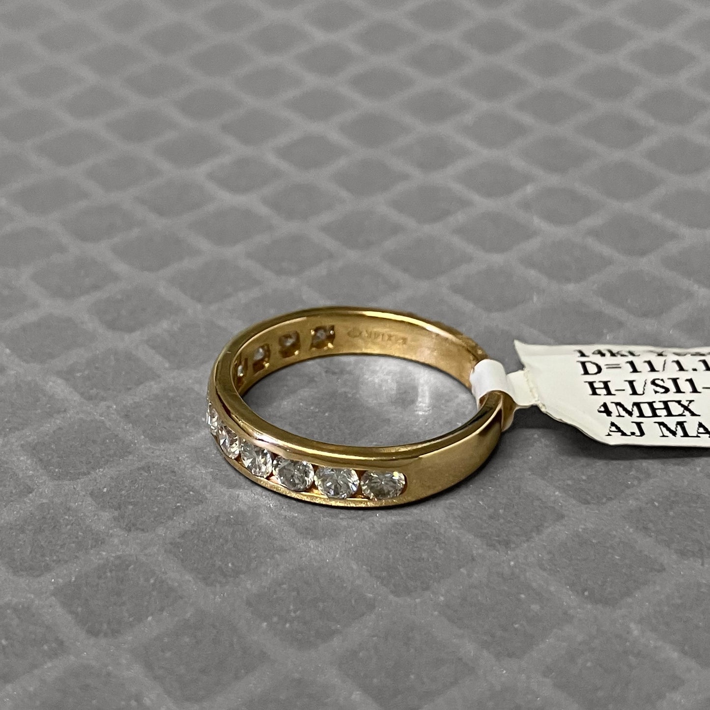 Preowned Yellow Gold and Channel Set Diamond Band