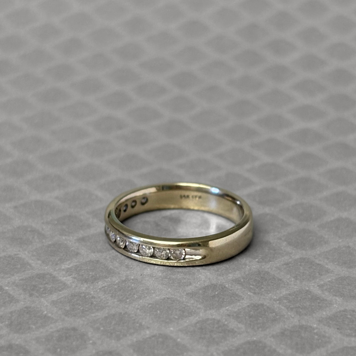 Preowned White Gold and Diamond Channel Set Band