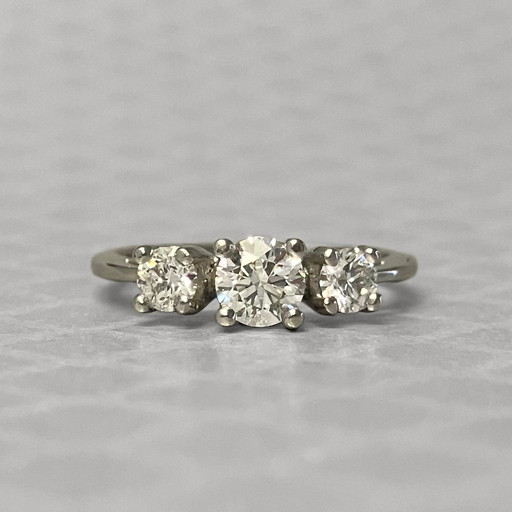 Preowned Platinum and Three Round Brilliant Cut Diamond Engagement Ring