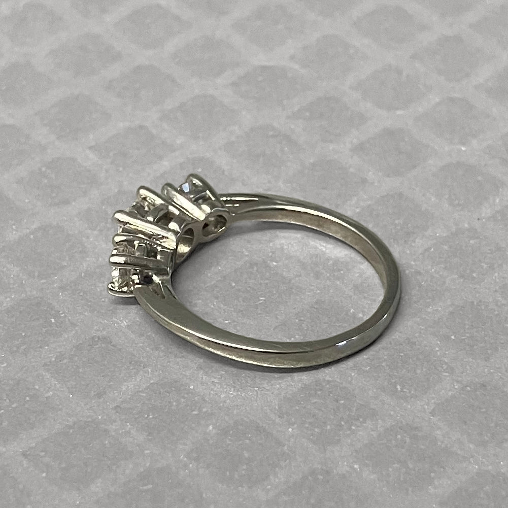 Preowned Platinum and Three Round Brilliant Cut Diamond Engagement Ring