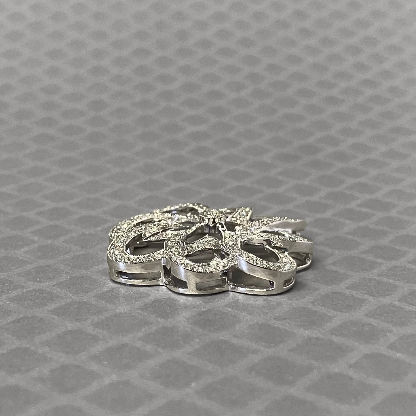 Preowned White Gold and Diamond Open Swirl Pendant