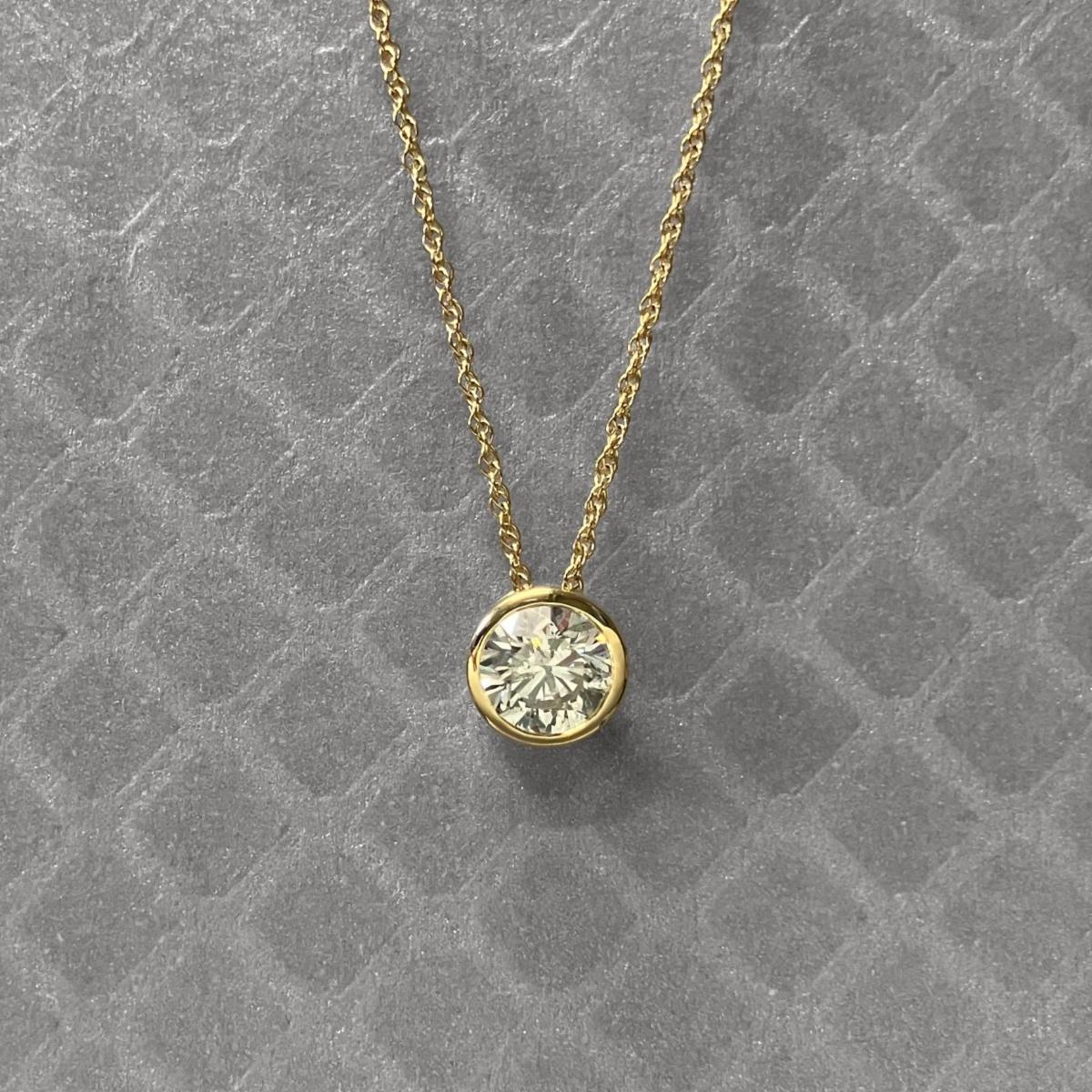 Preowned Yellow Gold and Round Diamond Bezel Set Pendant