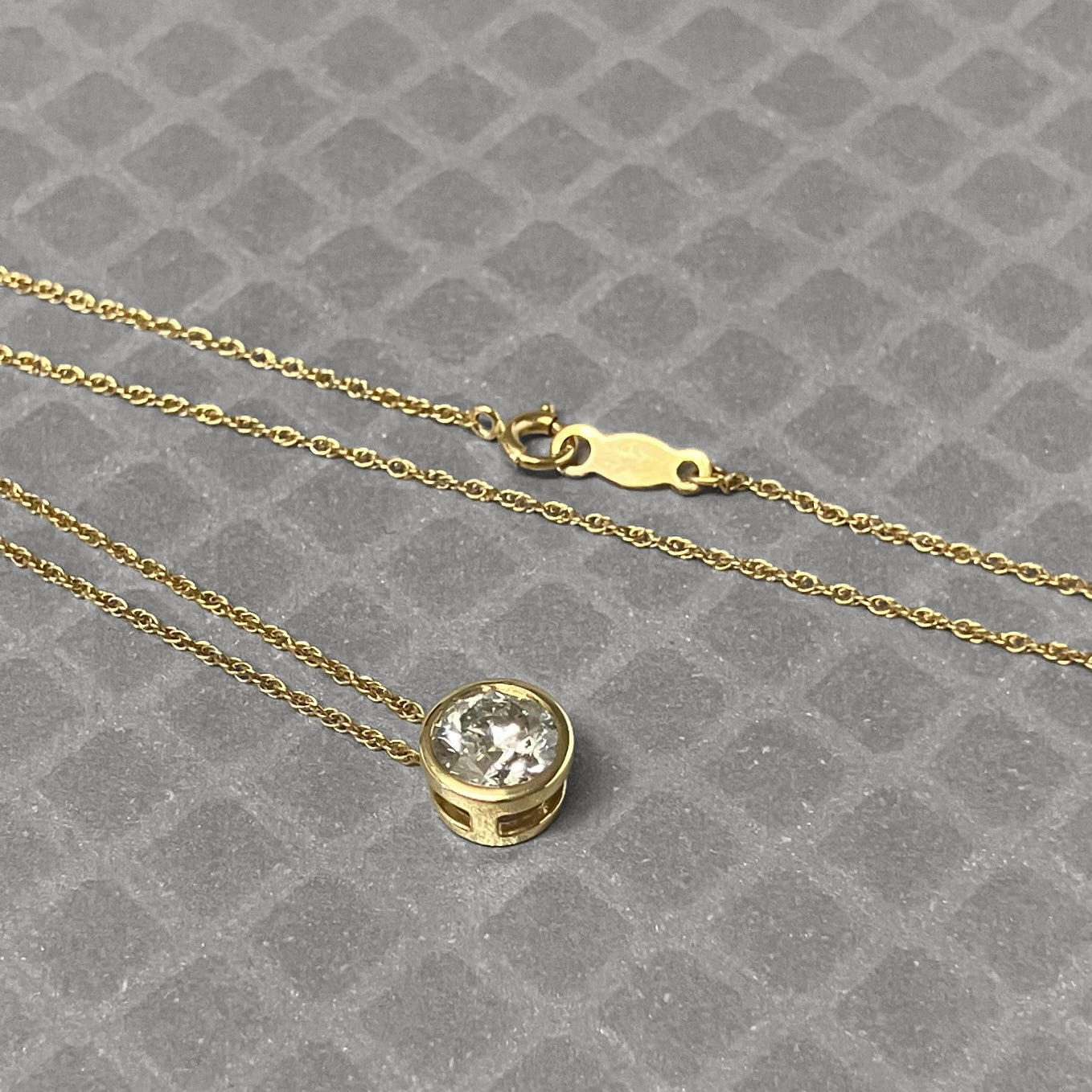 Preowned Yellow Gold and Round Diamond Bezel Set Pendant