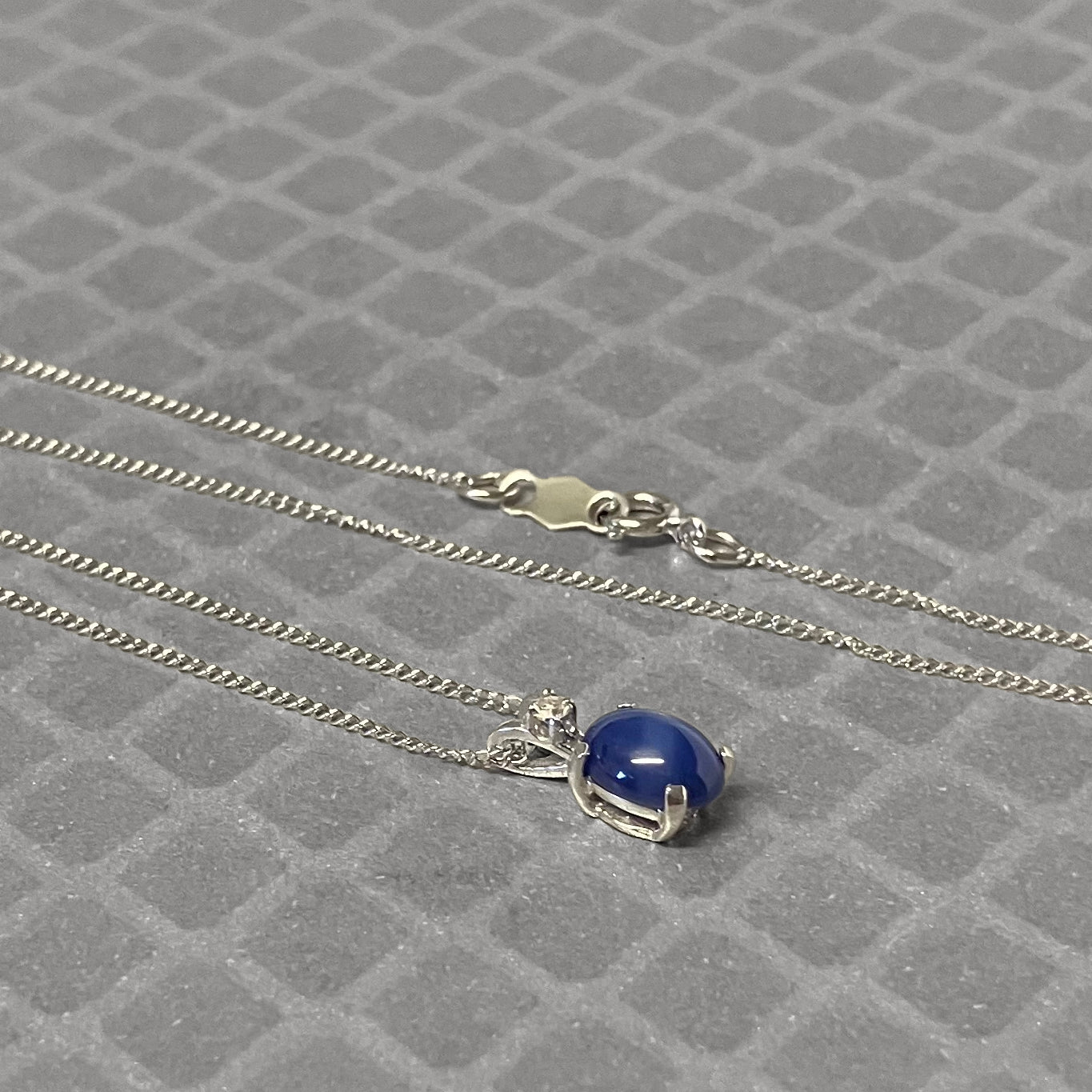 Preowned White Gold Synthetic Star Sapphire and Diamond Pendant