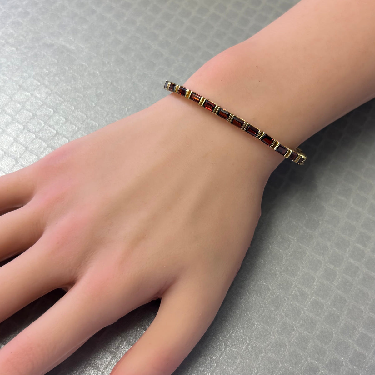 Preowned Yellow Gold and Emerald Cut Garnet Bracelet