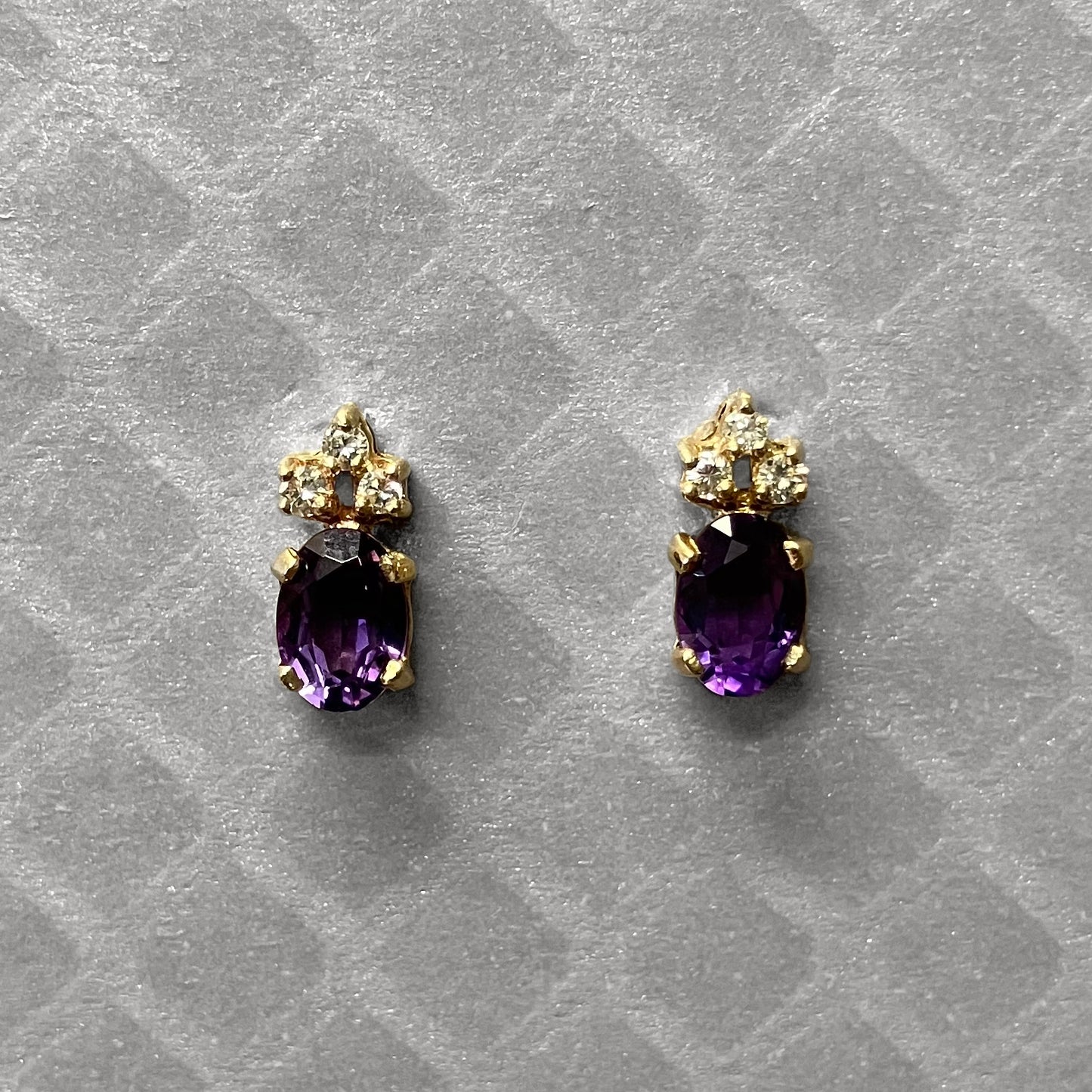 Preowned Yellow Gold Oval Amethyst and Three Diamond Stud Earrings
