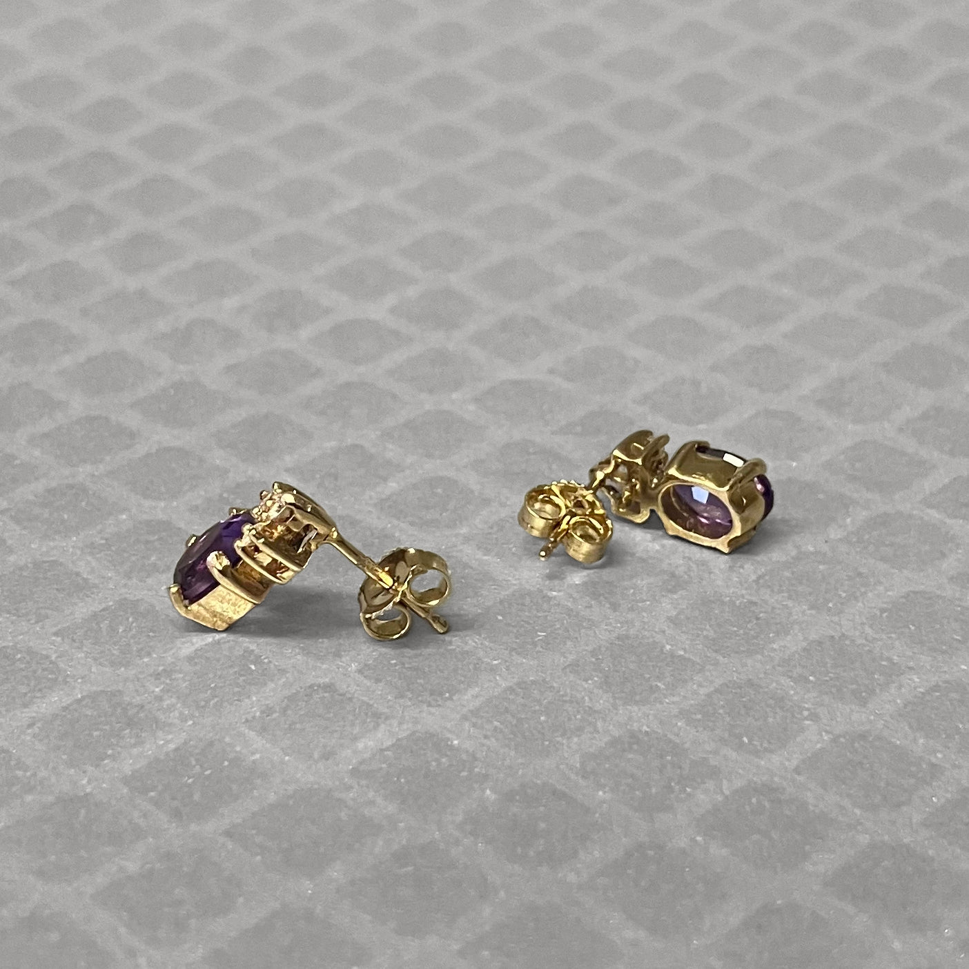 Preowned Yellow Gold Oval Amethyst and Three Diamond Stud Earrings