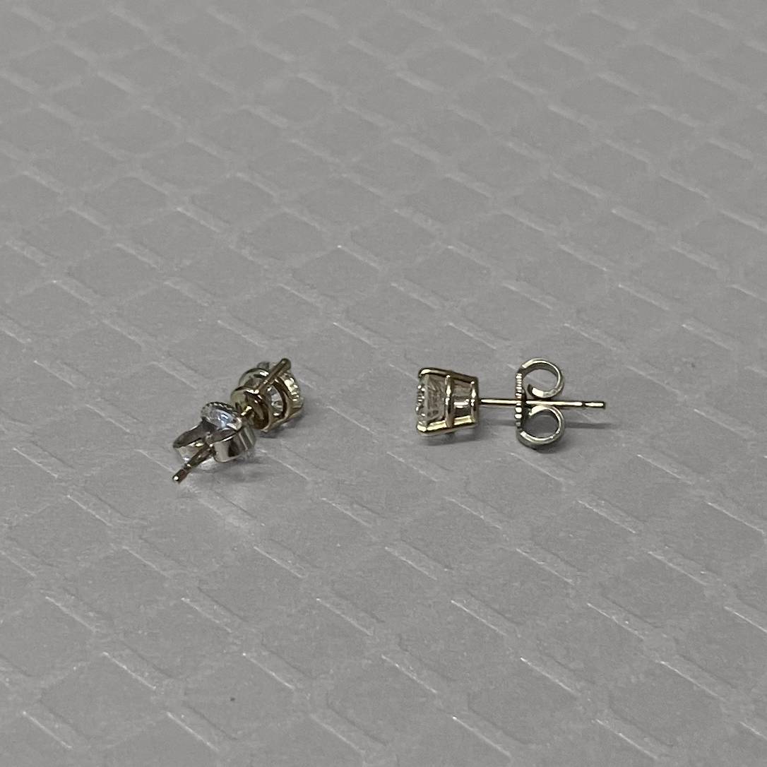 Preowned White Gold and Diamond Three Prong Stud Earrings
