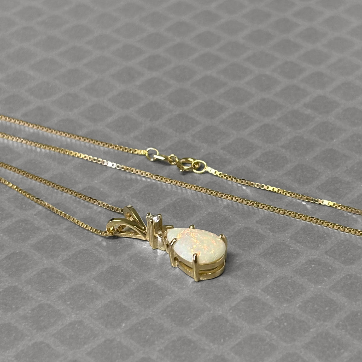 Preowned Yellow Gold Pear Shaped Opal and Diamond Pendant