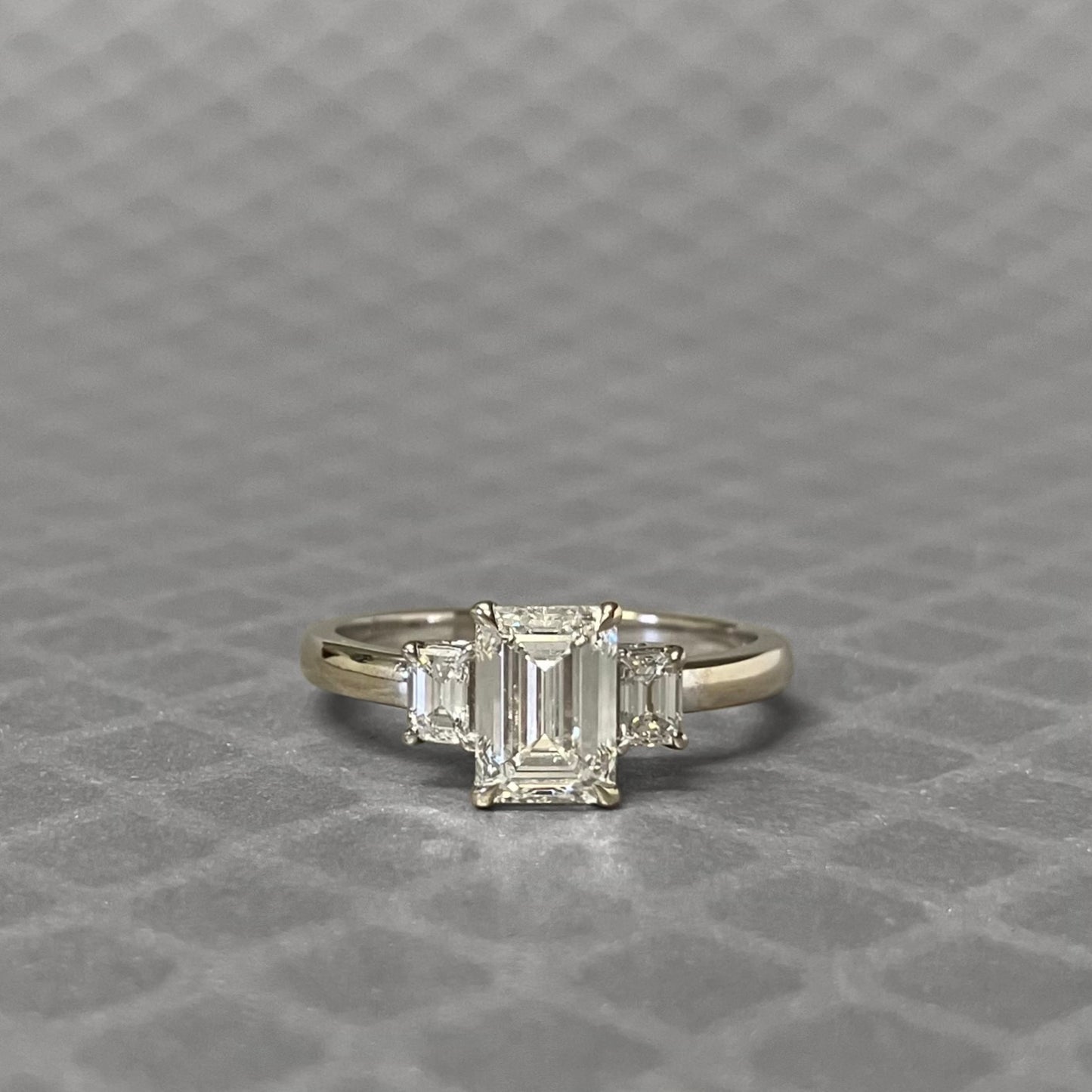 Preowned White Gold and Three Emerald Cut Diamond Engagement Ring