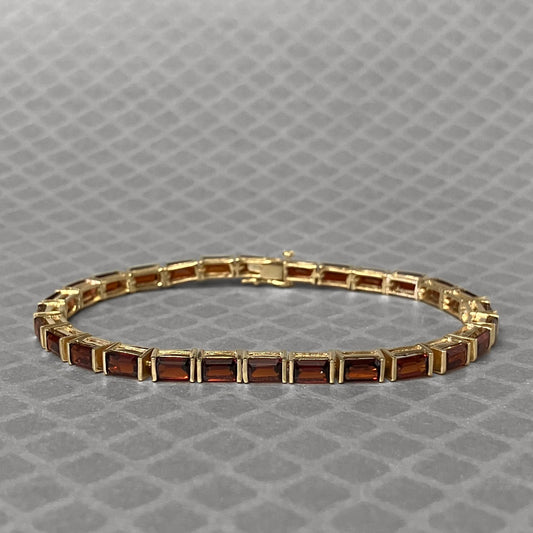 Preowned Yellow Gold and Emerald Cut Garnet Bracelet