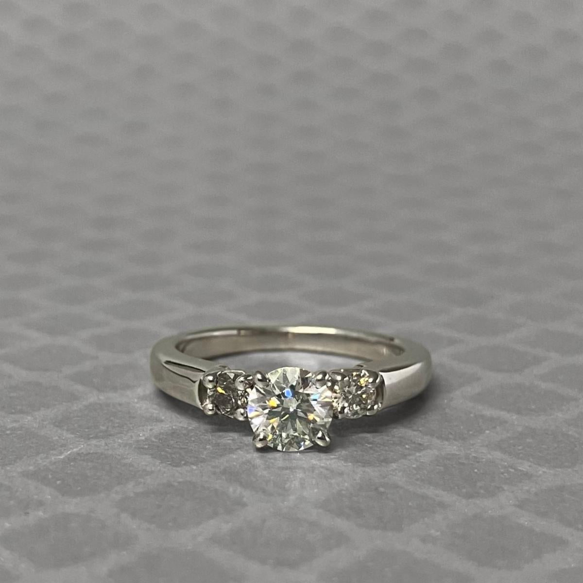 Preowned White Gold and Three Diamond Ring
